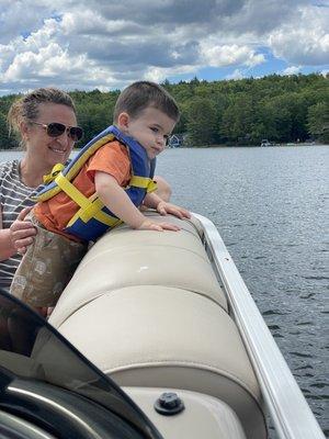 Curiosity with this little guy with my wife enjoying our grandson