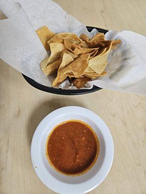 House-made tortilla chips with a spicy salsa