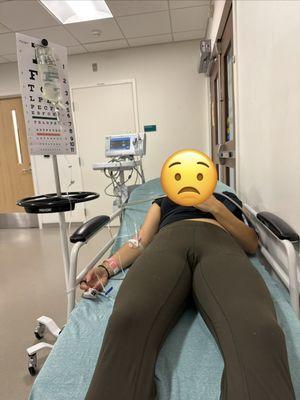 My wife getting treated at the hospital after treatment from Andrew Smyth.