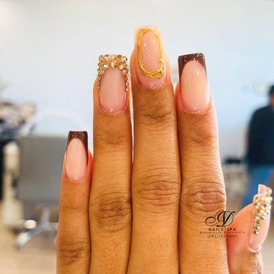 Simple French nails with delicate gems -- fall beauty at its finest. Natural, soft, and full of gratitude. Book your autumn look now!
