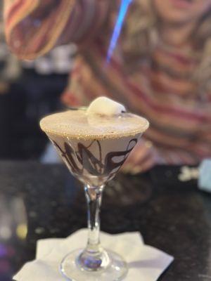 Their delicious s'mores martinis with a roasted marshmallow on top! Yum!
