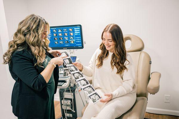Showing the mom her ultrasound photos