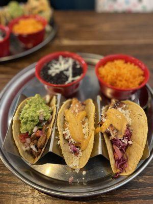 Street Tacos - Two fish tacos and one steak taco, beans and rice.