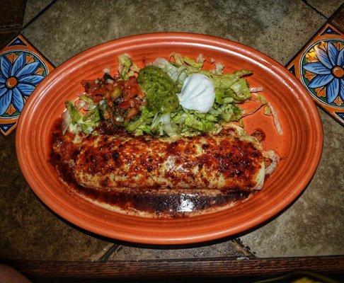 Burrito California Grilled chicken, chorizo, and tomato. Topped w/ queso and tomato sauce. Side of Guacamole salad and sour cream