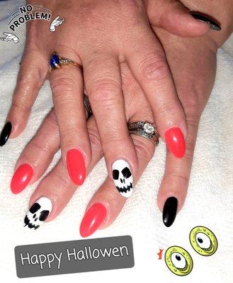 Come see Mike at 5 star nail spa hes amazing look at this Skull for Halloween all done by hand. Mike is accurate and very professional.