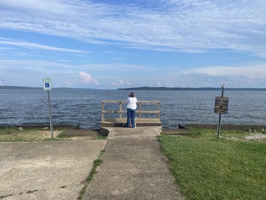 C checking out the landscape of the binoculars.