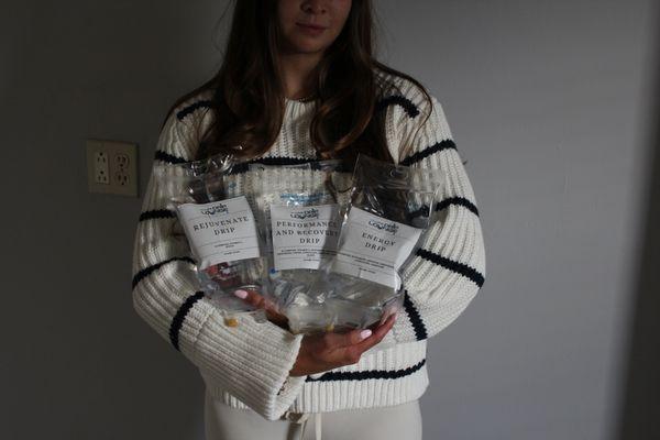 Hydration and vitamin drips ready for delivery -- NY Drip Lounge's personalized IV therapy bags featuring various wellness blends.
