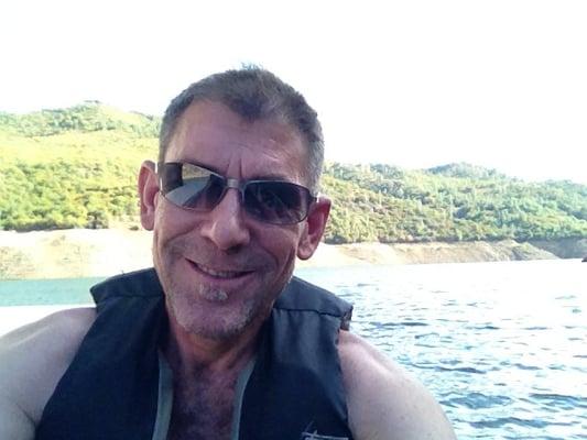 Me having a blast in a leaky boat on Lake Don Pedro