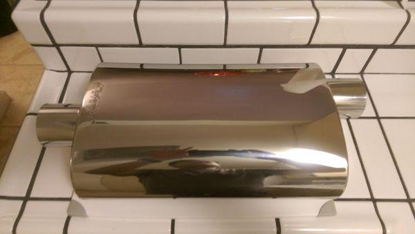 Straight-thru, perforated steel core, wrapped in steel wool and mesh, housed inside corrosion-resistant, T304 stainless steel muffler.