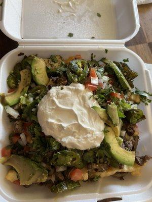 Asada fries extra jalapeños