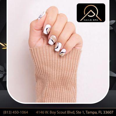 GRAND OPENING - COMING SOON
Sleek and stylish with white and gold line nails--elegance in every detail!