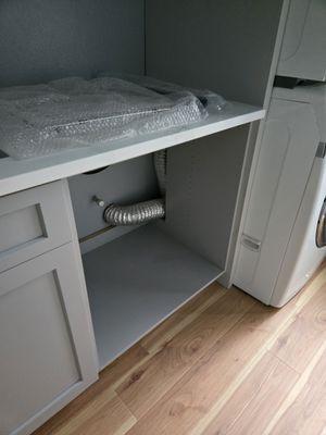 Missing shelves and doors.