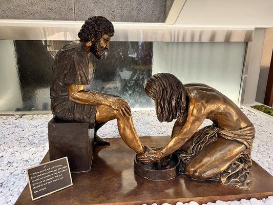 Backstage Tour: founder, S. Truett Cathy truly believed in being a GOOD AND FAITHFUL SERVANT! (JESUS washing the feet of a beloved disciple)