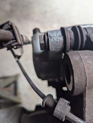 Close up of missing bolt. This bolt gets torqued to 295 ft/lbs. It was either never torqued or not installed.