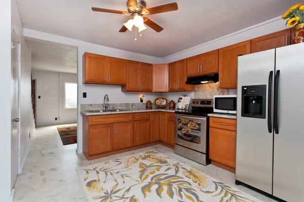 Owner fully renovated this 2 bedroom, 1.5 bath unit w/enclosed lanai.