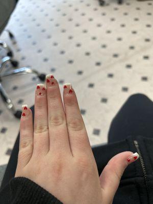 I asked for French tips with red hearts and they got it down totally recommend