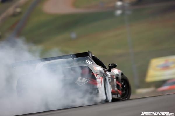 Luke Lonberger in his 2011 Formula D C6 Corvette, drifting ATL with full Mil-spec engine and chassis harnesses and switch panel.