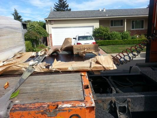 My bed head board traveled like this: for hours exposed to the sun and other road conditions.