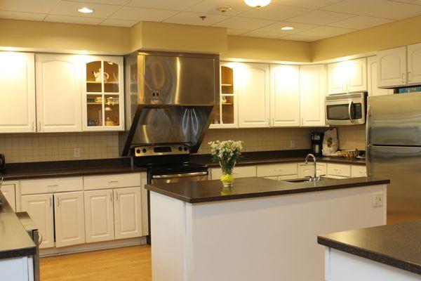 The kitchen is a popular spot to gather for meal preparation, chat or read the newspaper.