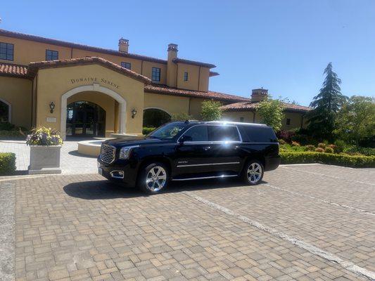 Pick up 4 passengers from Portland airport to domaine serene in Dundee, OR, for wine tasting.