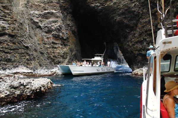 Both of our boats entering multiple sea caves