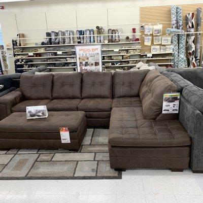 Brown sectional couch.