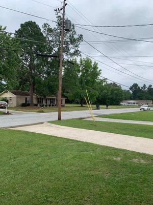 Home with lot and notice when cleaning what little they did they put debris on street