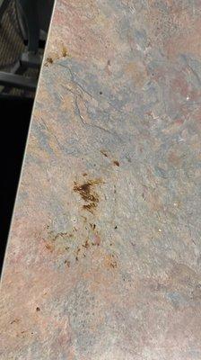 Table covered in poop.