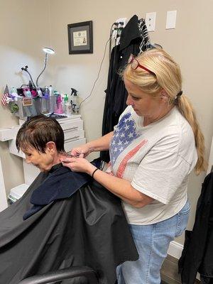 At work cutting hair