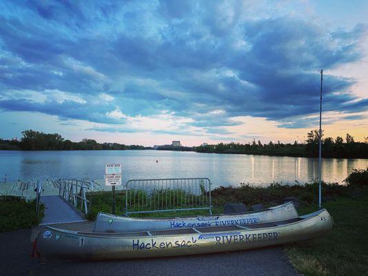 canoes and dock at sunset
