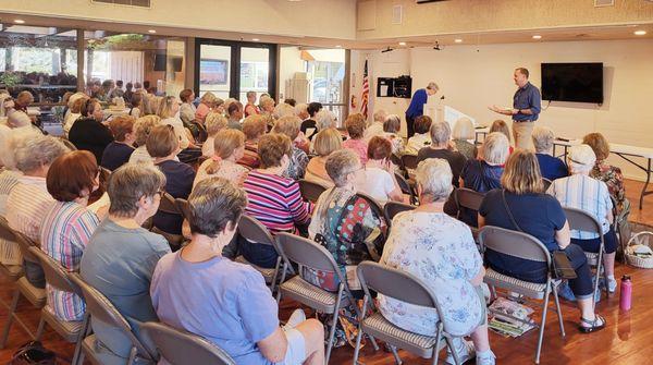 Dr. Sutton in one of our neighboring communities teaching them stretches that are great for their club members, specifically.
