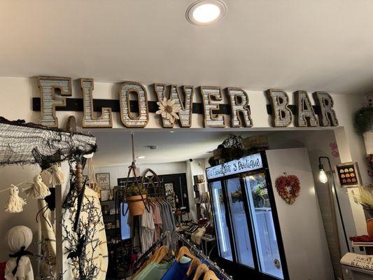 This is the name of the boutique, the flower bar