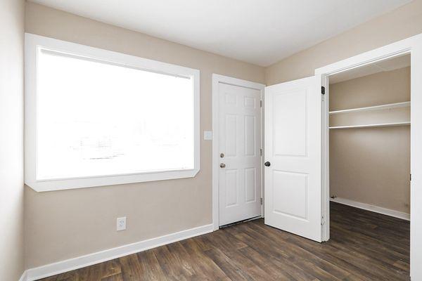 KITCHEN VIEW SHOWING LAUNDRY/STORAGE AREA W/D HOOK-UP.
