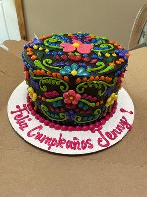 Custom rush made to order cake with chocolate and vanilla layers and strawberry filling between