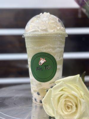 Our matcha milk smoothie with cheese foam and whipped cream on top