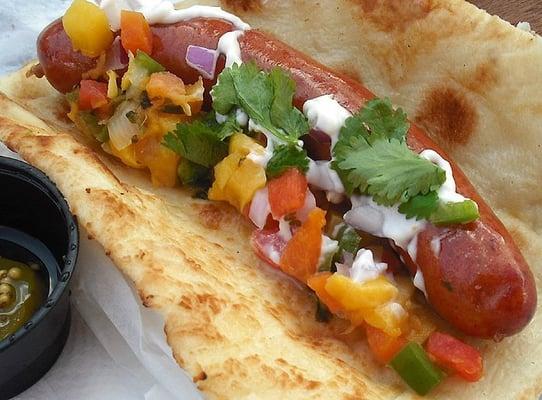 The "Beer Hot", Aiko style (with mango chutney, jalapenos, red onion, cilantro, and mayo). Really good!