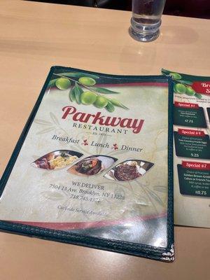 The cover of the menu and their daily specials