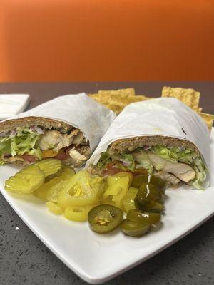 Chicken bacon sandwich with side of chips