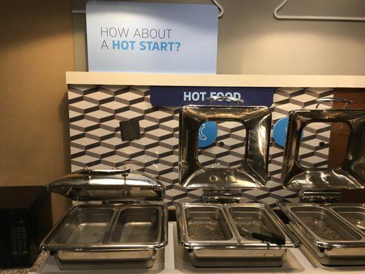 There was no hot food left! They stopped serving breakfast before official breakfast hours were over.