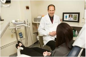 Dr. James Dores of Dores Dental speaking with a patient!