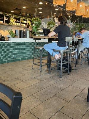 Lots of people working indoors