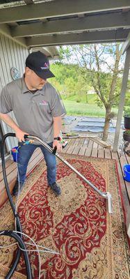 Outside rug. Been out there all winter. WOW! I thought I was going to throw away. But it's beautiful.