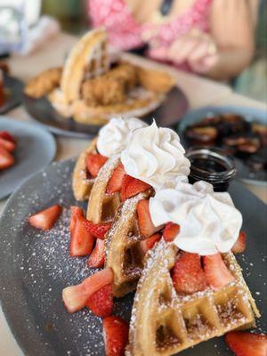 Waffles topped with fruit & whipped cream