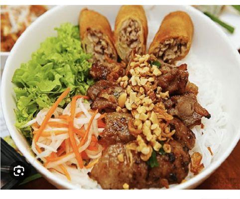 Grilled pork and eggrolls rice noodles