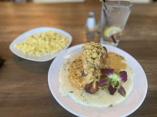 Ocean Bliss Grits with Lobster tail and Eggs on side.