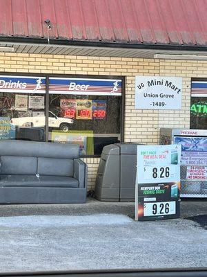 Store Name sign on front of building Nothing on road