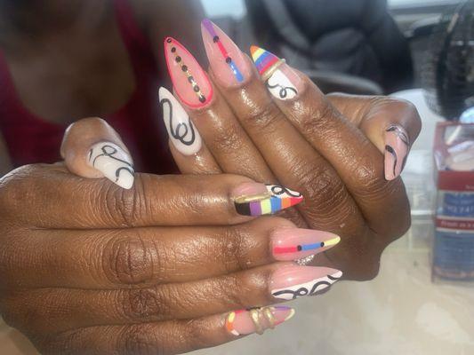 Gel polish with dishes on every nail done by Cindy