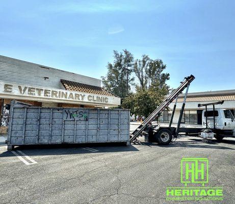 40 yard dumpster being delivered to a veterinary cliner in Mira Loma. This is schedule for a facelift this week.