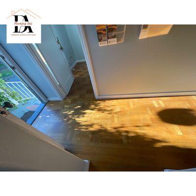 Before photo os hardwood floors before sanding down to apply new varnish