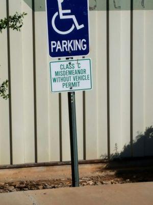 Very little parking, one handicap spot, the lot is in ill repair.